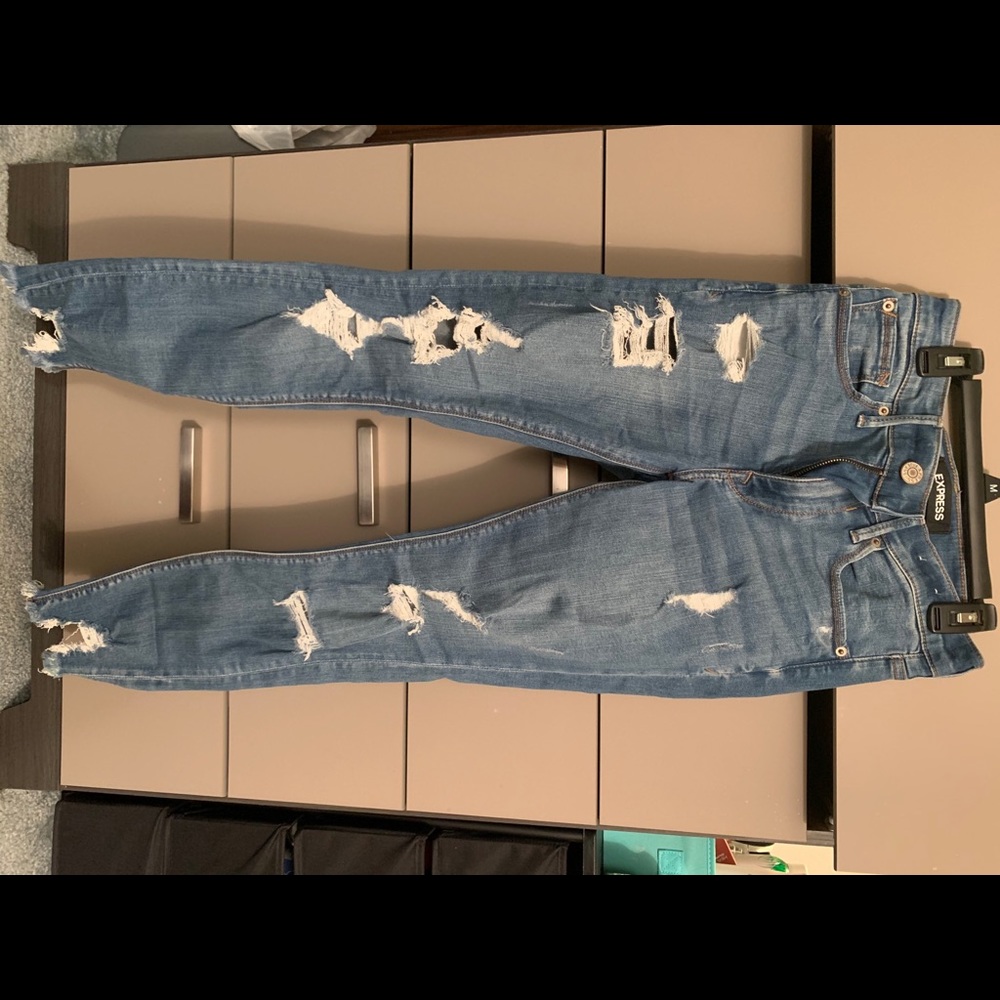 Skinny mid-rise distressed denim jeans